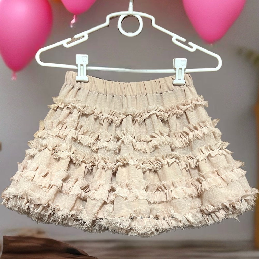 Girls Ruffled Ivory Tiered Mini Skirt with rhinestone embellishments